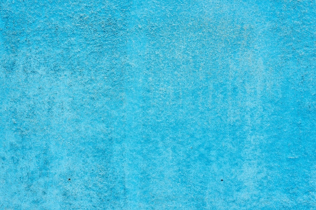 Blue wall texture. Blue block cracks textured background.