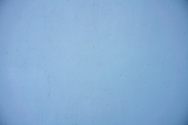 Photo a blue wall with a white background with a blue background