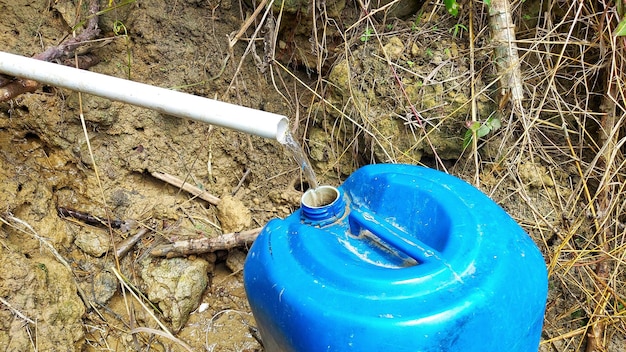 A blue water bottle is filled with water.