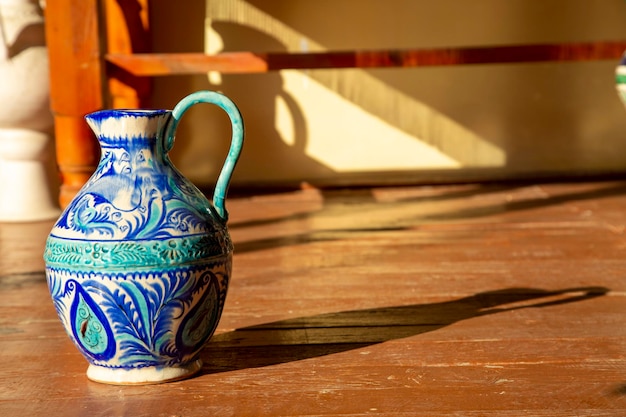 A blue water jug in a side