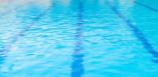 Blue water and laens in swimming pool