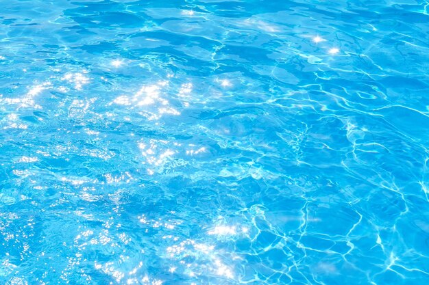 Blue water pool background texture abstraction solar bright light