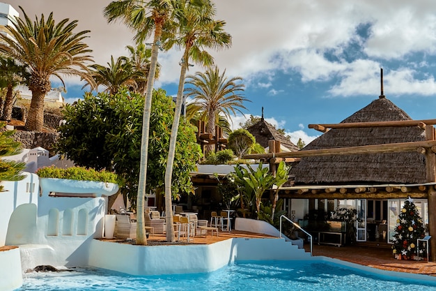 Blue water in the swimming pool on vacation