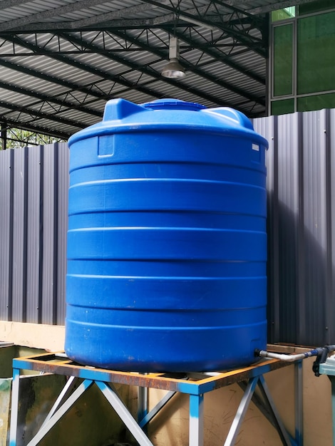 Blue water tank of industrial building