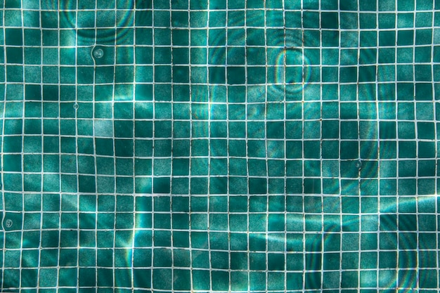 Blue water texture, tiles pool.