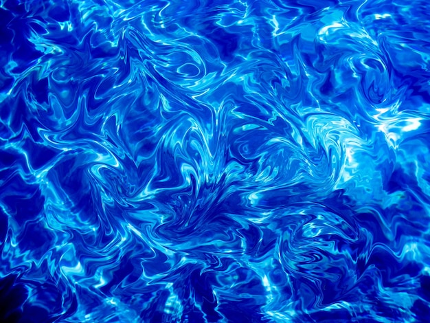 Photo a blue water with a pattern of swirls in it