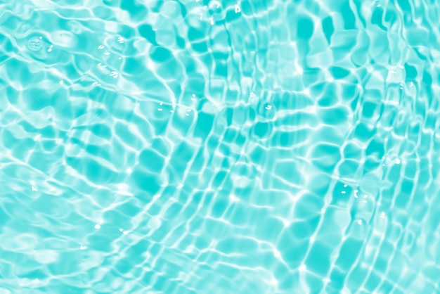 Blue water with ripples on the surface Defocus blurred transparent blue colored clear calm water