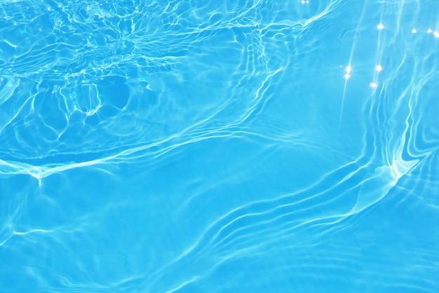 Blue water with ripples on the surface Defocus blurred transparent blue colored clear calm water