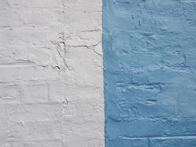 Photo blue and white brick wall background