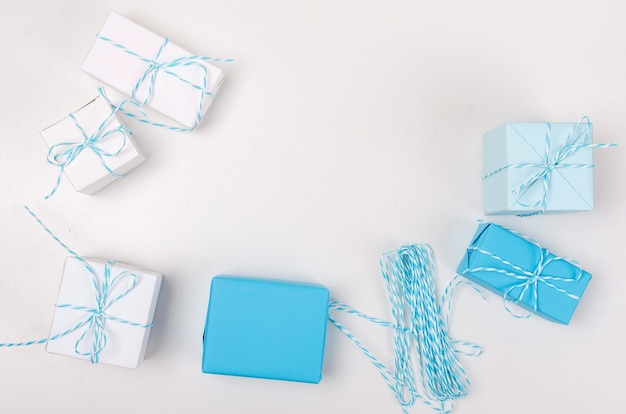 Photo blue and white gift boxes with ribbon