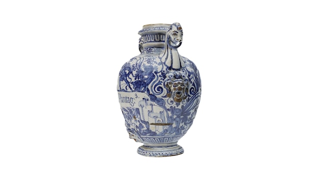 A blue and white vase with a floral design on the front.