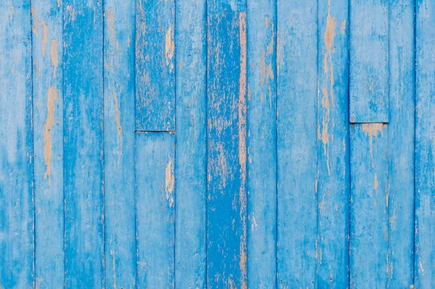 Blue wood background Wooden sticks Connected to create a wall to be private to prevent danger