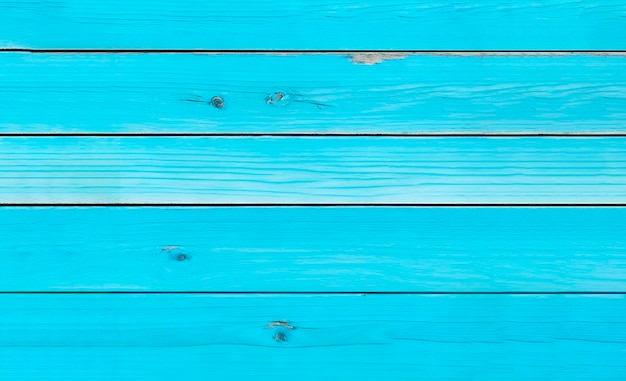 Foto una tavola di legno blu con la parola blu sopra