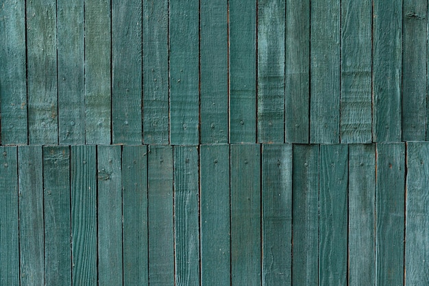 Blue wood textured background wooden wall or fence with zigzag\
planks seamless herringbone pattern high quality photo