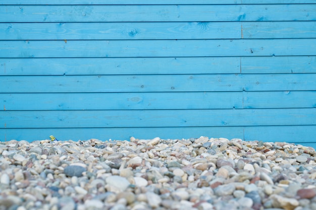 Blue wooden texture with rocks