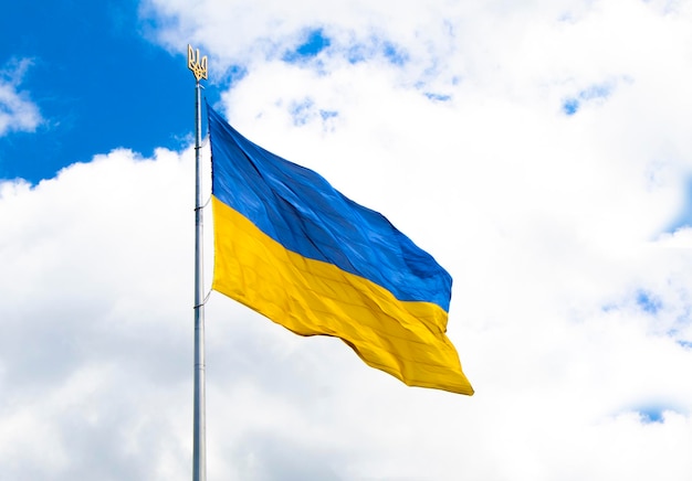 A blue and yellow flag with the word ukraine on it