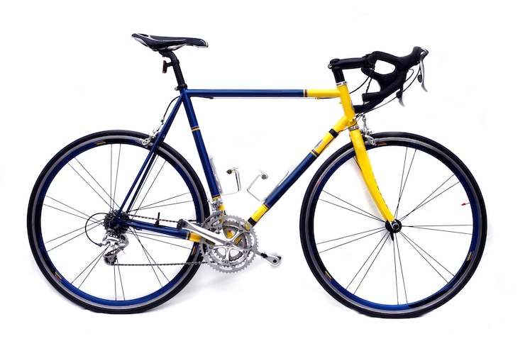 Photo a blue and yellow road bike