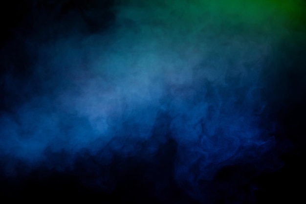 Blue and yellow steam on a black background Copy space