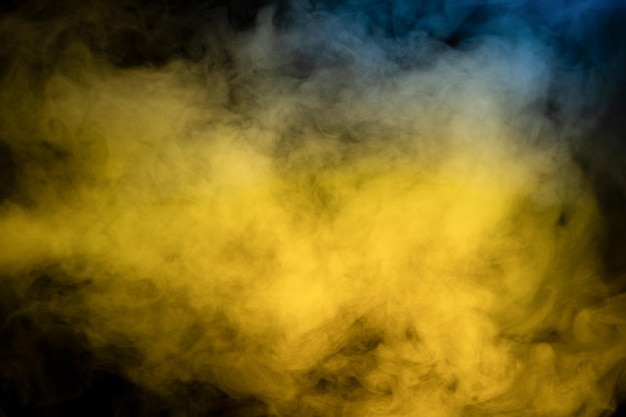 Blue and yellow steam on a black background