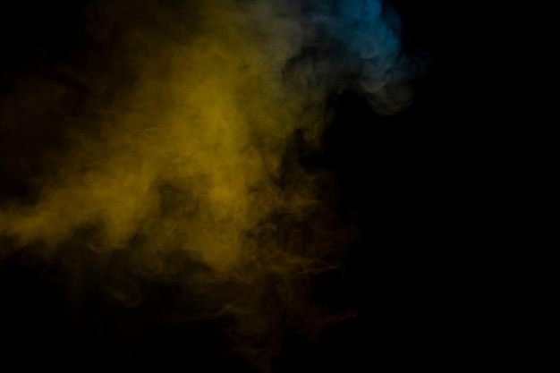 Blue and yellow steam on a black background