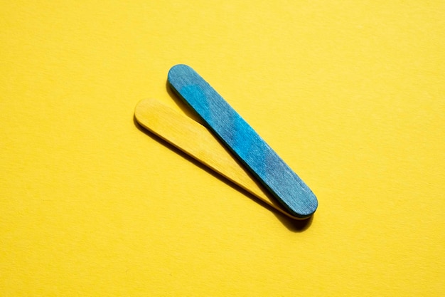 blue and yellow stripes on a yellow background