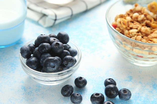 Blueberries on a blue background.