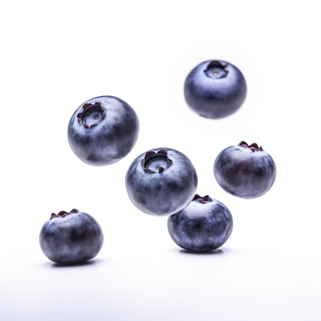 Blueberries floating on white background