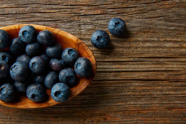 Blueberries fruits on a wooden board table