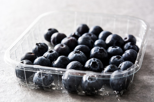 Blueberries in on gray stone