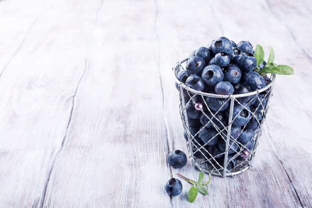 Blueberries in metal cup