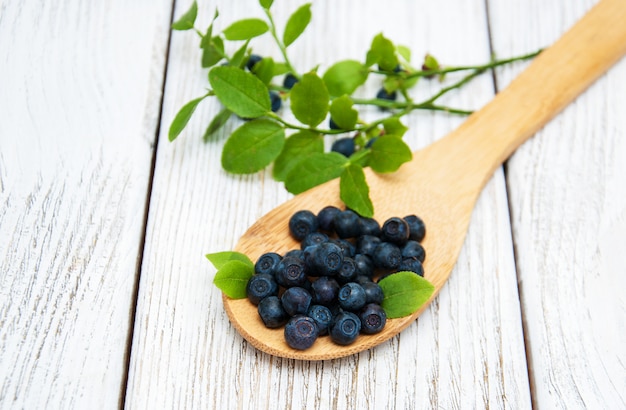 Blueberries on a old wooden background