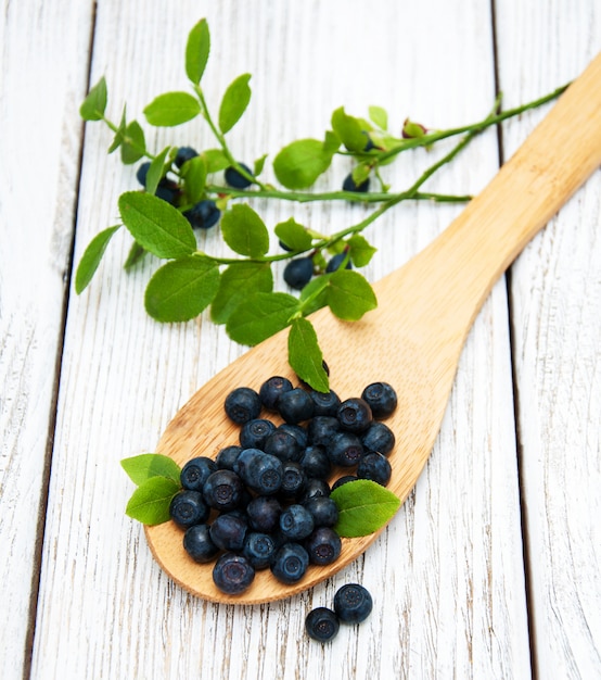 Blueberries on a old wooden background