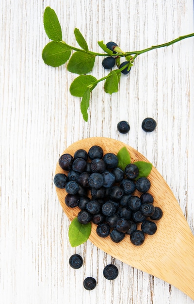 Blueberries on a old wooden background