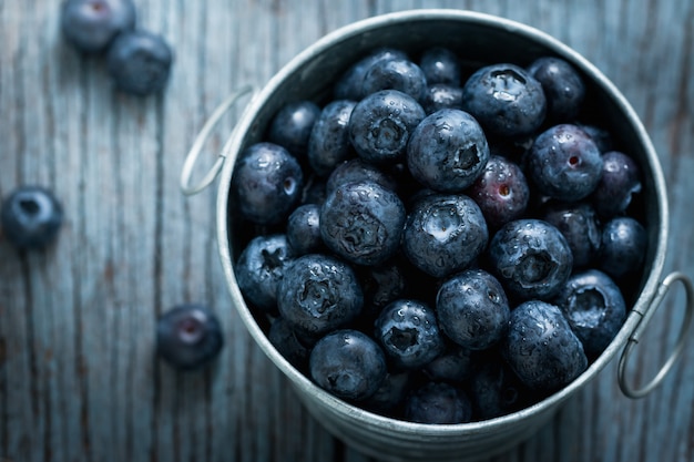 Blueberries in a vintage zinc cup