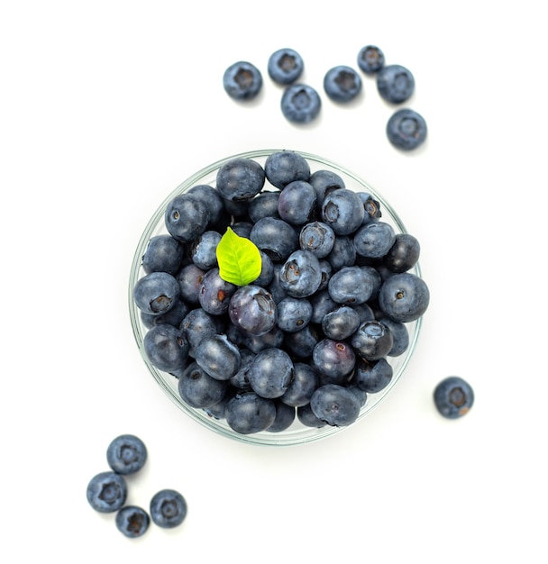 Blueberries with leaves on white background