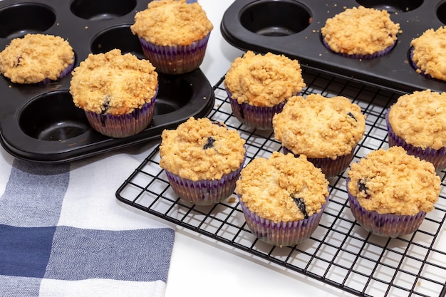 Blueberry Apple Oats streusel Muffins on cooling rack. 