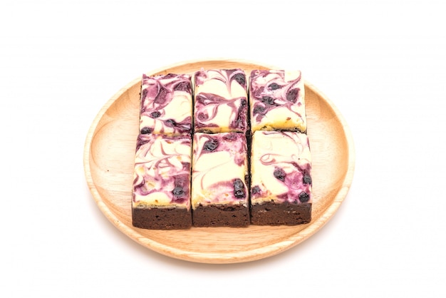 blueberry cheese brownies on white 