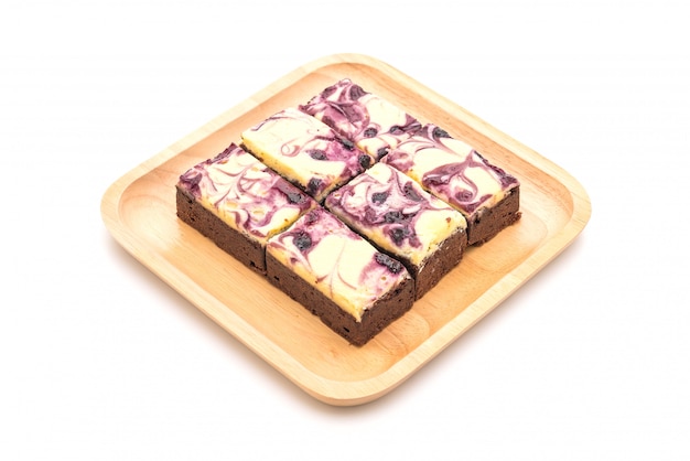 blueberry cheese brownies on white 