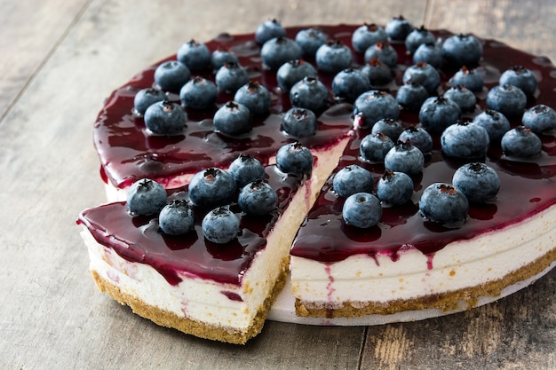 Blueberry cheesecake on wooden table