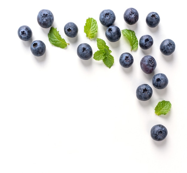 Blueberry fruit top view isolated on a white background, flat lay overhead layout with mint leaf