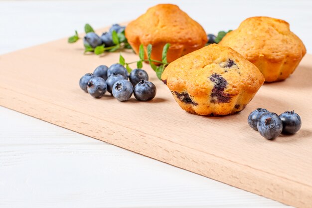 Blueberry muffin. Homemade baked cupcake with blueberries, fresh berries, mint 