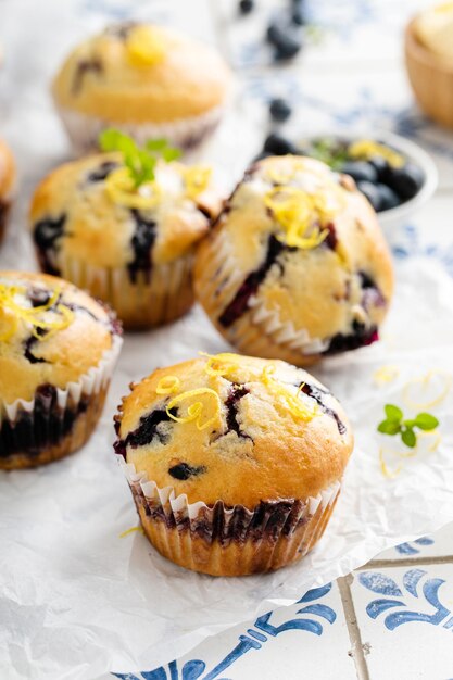 Blueberry muffins with fresh berries and preserves