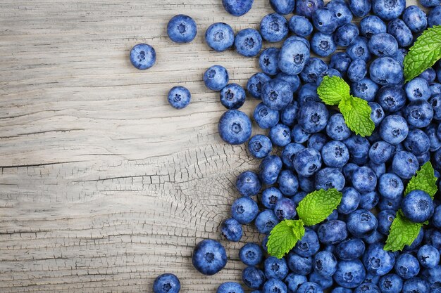 Blueberry on old wood background