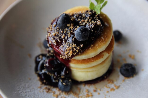 Blueberry pancake , Pancake topping with blueberries and icing dessert