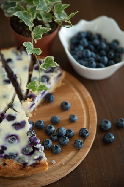 Blueberry pie on a wooden background wallpaper