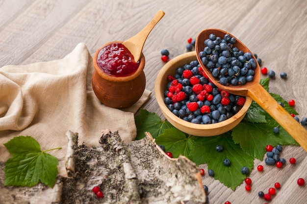 Blueberry and raspberry berry jam with fresh berries