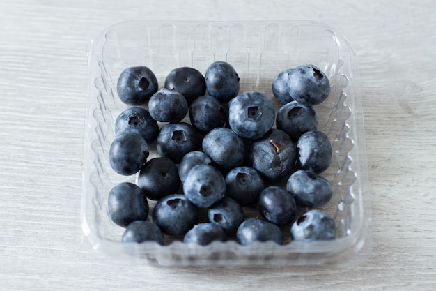 blueberry on white wood