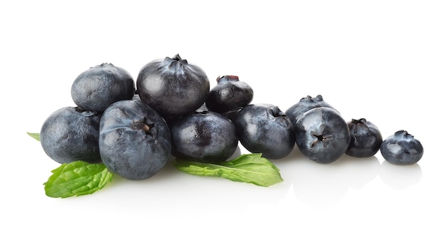 Blueberry with green leaves isolated on a white background