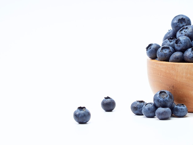 Blueberry in wooden bowl