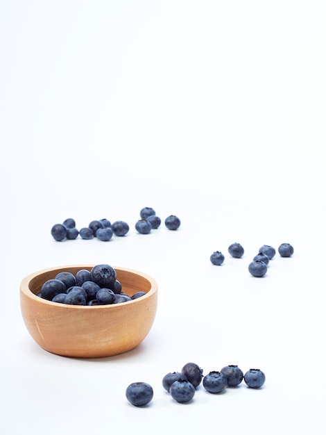 Blueberry in wooden bowl